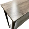 Wooden table corner with metal legs