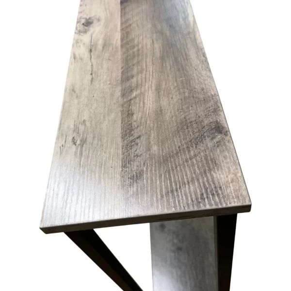 Close-up of wood table surface with grain texture.